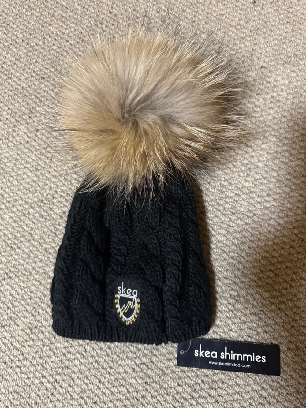 NWT, Skea, Big Pom Betty Hat. Gorgeous 9 inch Fur Pom, luxury Knit cable hat!